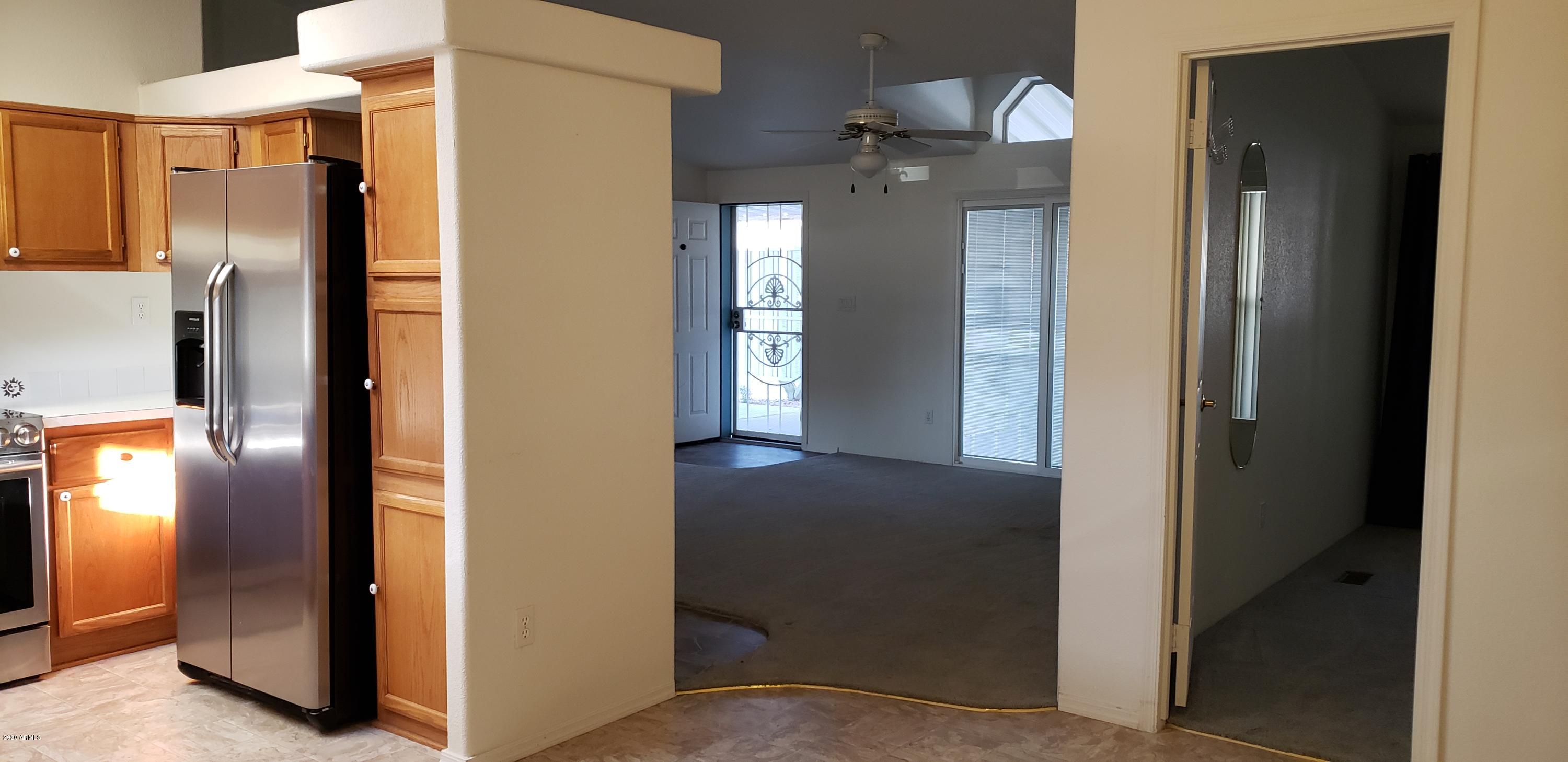 3355 South Cortez Road, Unit 9 Apache Junction, AZ 85119 - Photo 4 of 27 enter at carport door