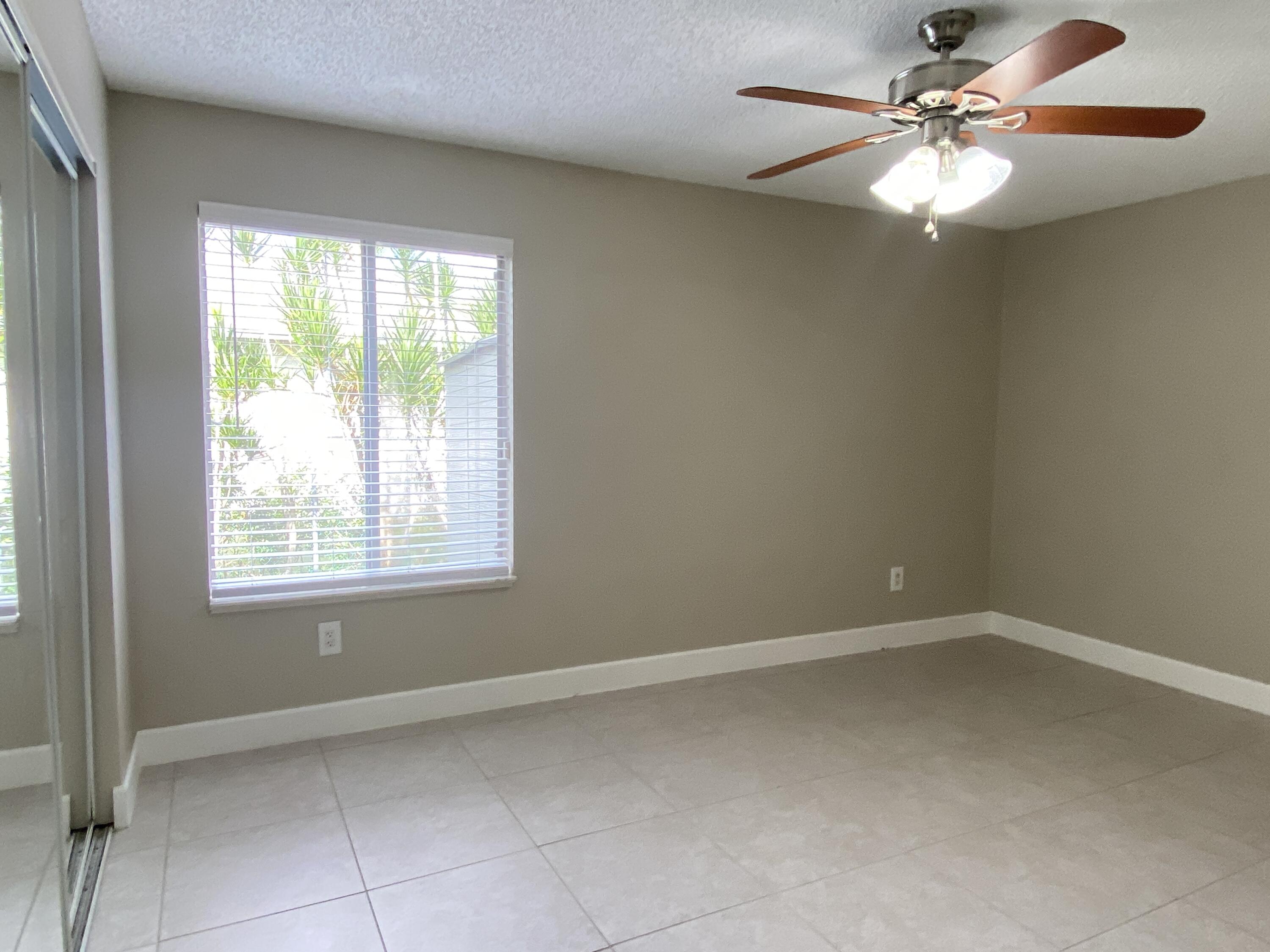 8233 Scenic Turn Boca Raton, FL 33433 - Photo 23 of 39 Primary Bedroom