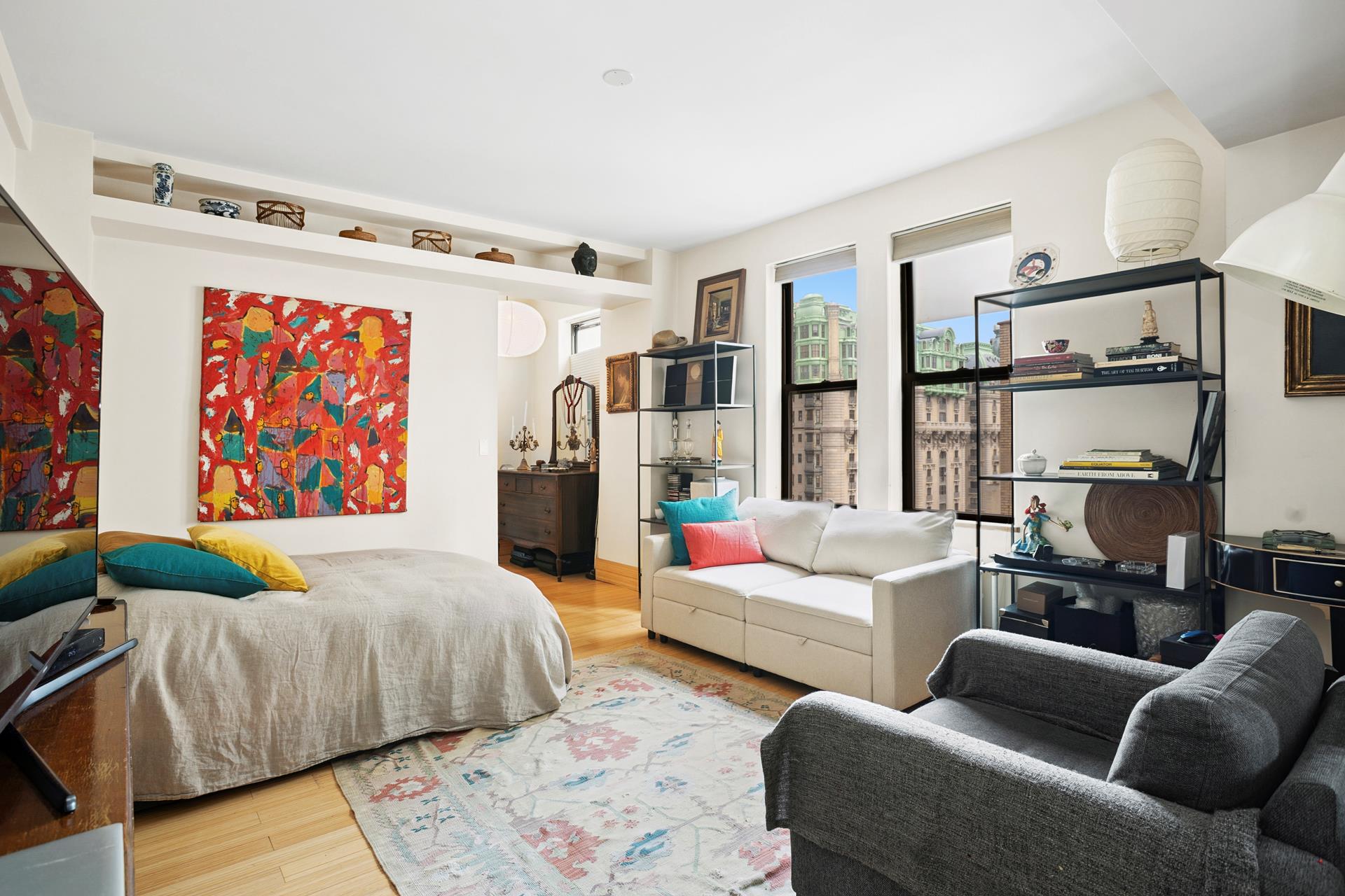 a living room with furniture and a rug