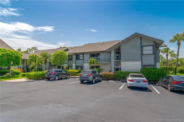 a car parked in front of a house