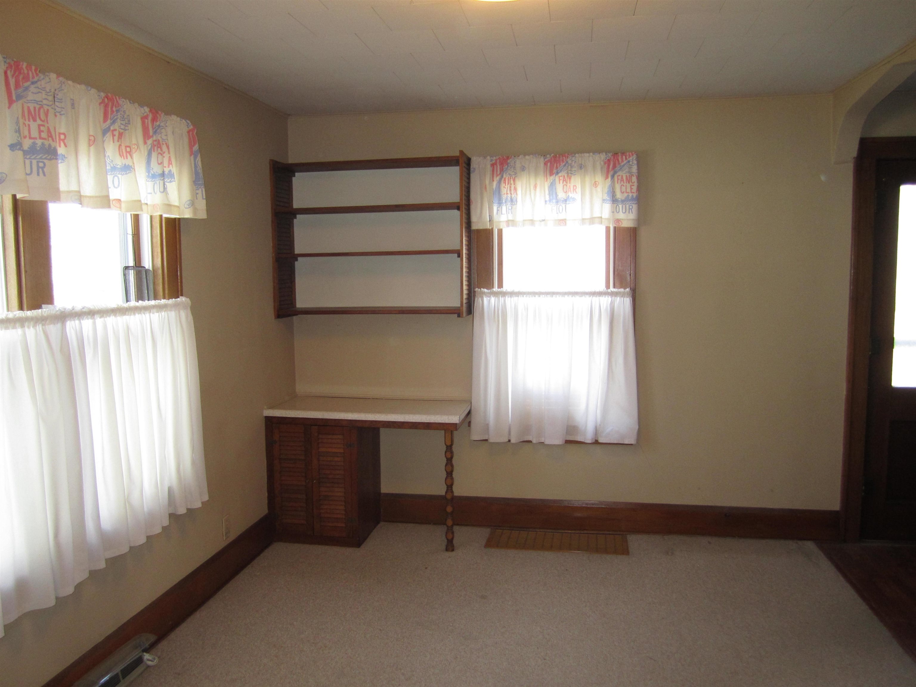 1107 South Main Street Belvidere, IL 61008 - Photo 7 of 21 a room that has a window in it