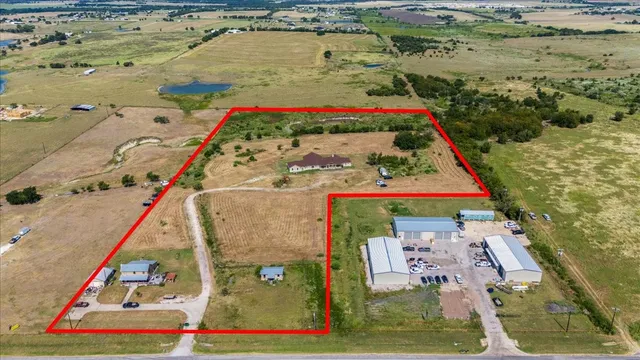 an aerial view of house with outdoor space