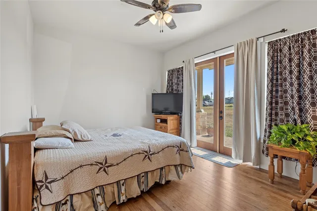 a bathroom with a sink mirror vanity and toilet