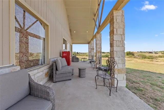 a view of a house with a yard and garage
