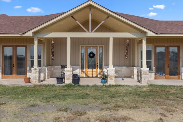 a front view of a house with patio