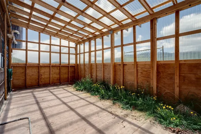 a view of a yard with furniture