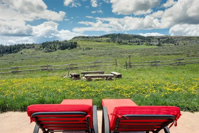 a view of a lake with a big yard