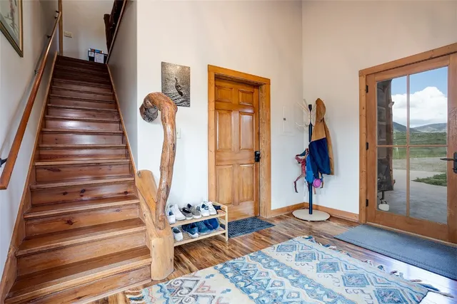 a view of an entryway with staircase