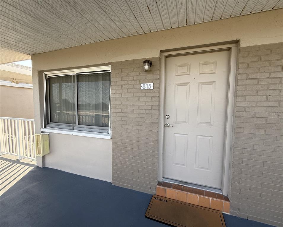 800 North Fiske Boulevard, Unit 815 Cocoa, FL 32922 - Photo 1 of 14 an empty room with windows