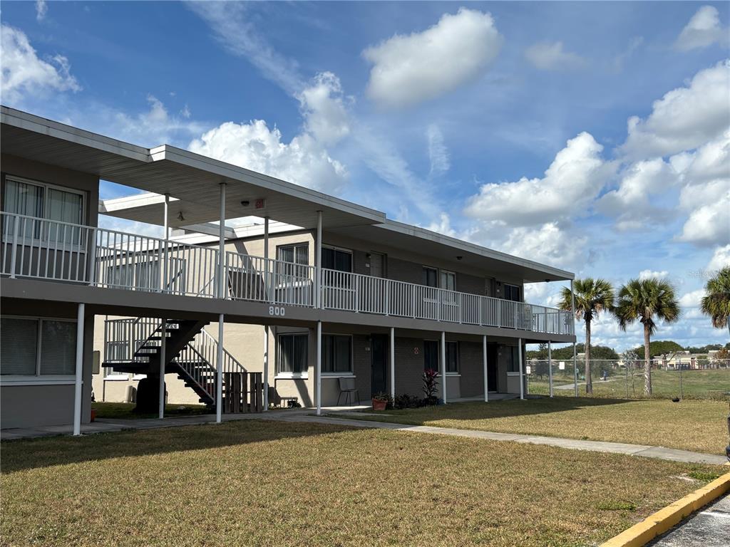 800 North Fiske Boulevard, Unit 815 Cocoa, FL 32922 - Photo 13 of 14 a front view of a building with garden