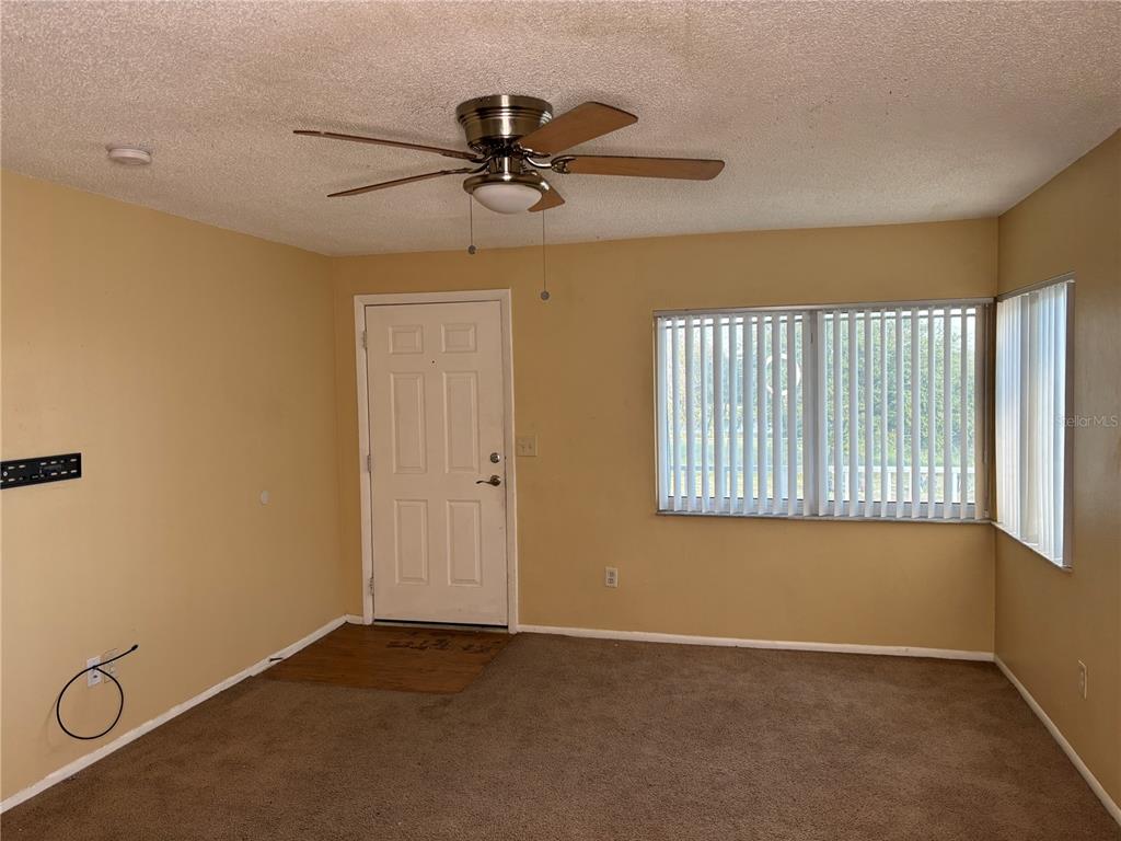 800 North Fiske Boulevard, Unit 815 Cocoa, FL 32922 - Photo 4 of 14 a view of an empty room with a window