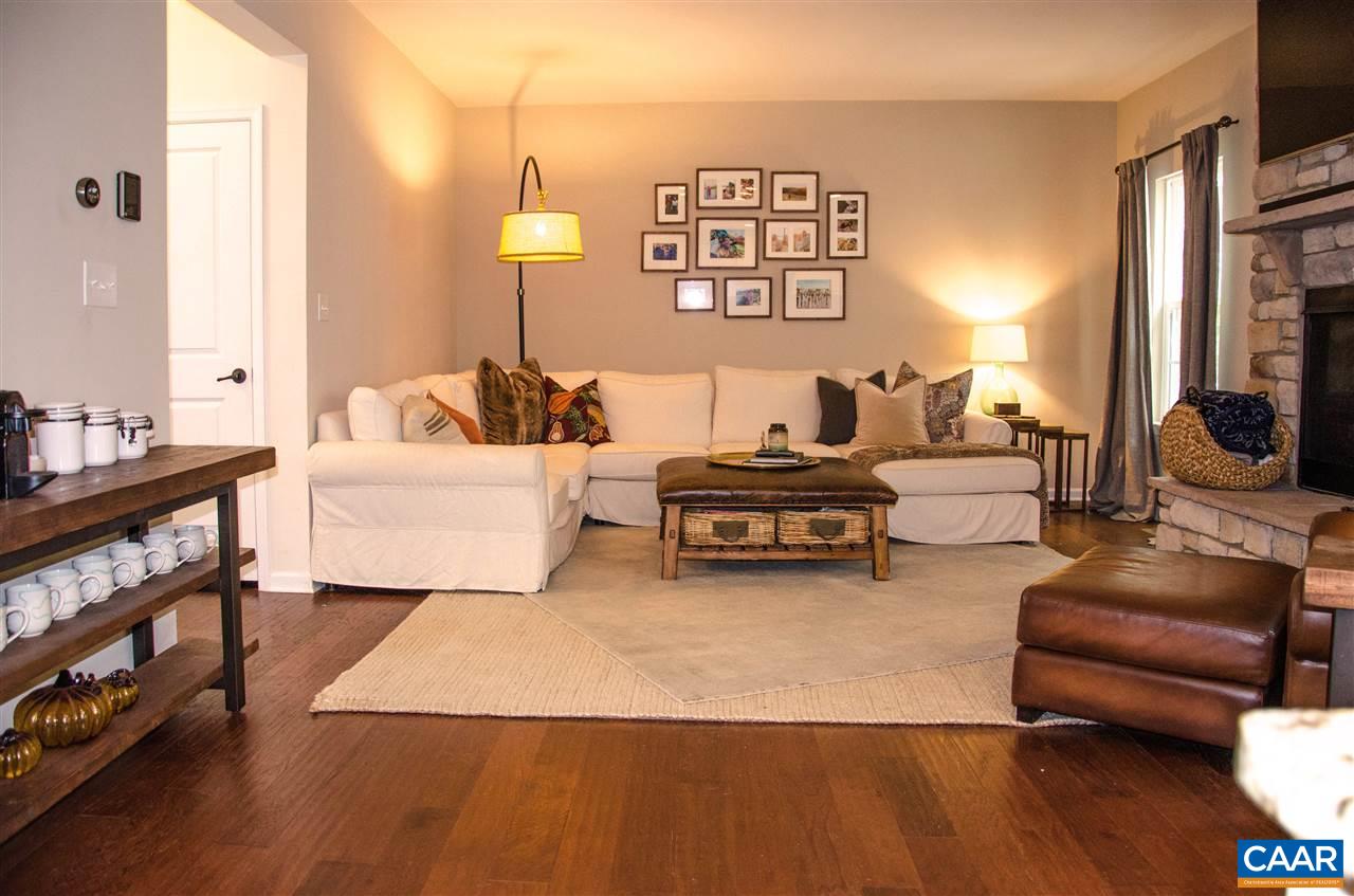 292 Ridgemont Road Ruckersville, VA 22968 - Photo 11 of 50 a living room with furniture and a flat screen tv