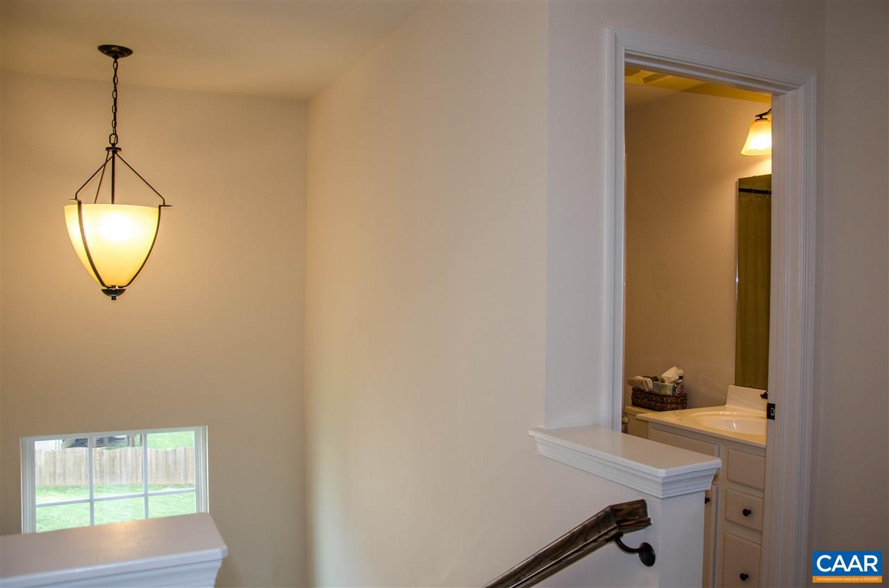 292 Ridgemont Road Ruckersville, VA 22968 - Photo 17 of 50 a view of a room with a table and a mirror
