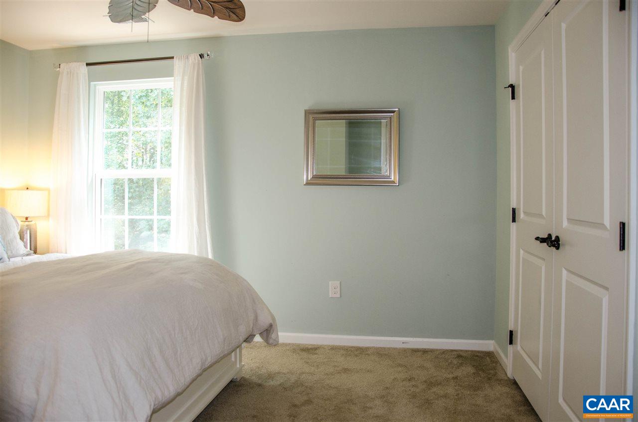 292 Ridgemont Road Ruckersville, VA 22968 - Photo 20 of 50 a bedroom with a bed and a window