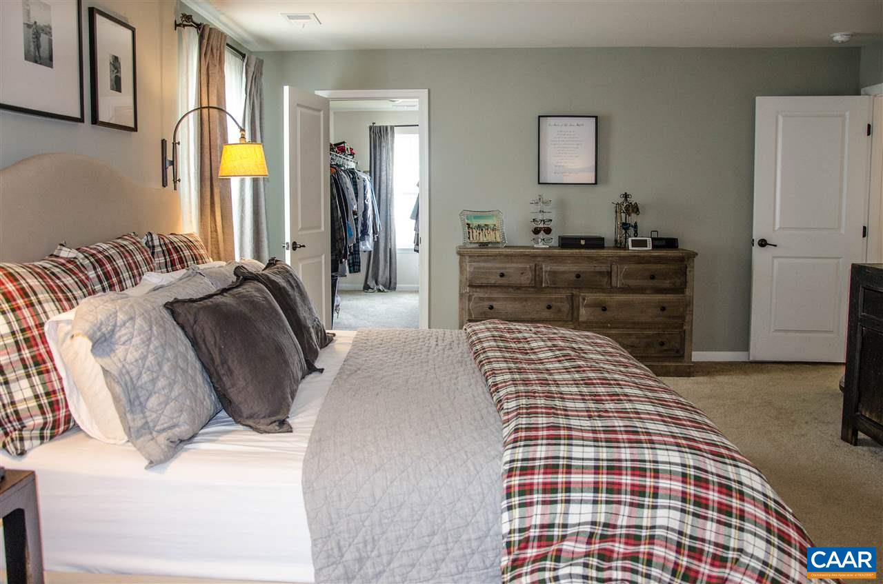 292 Ridgemont Road Ruckersville, VA 22968 - Photo 22 of 50 a bedroom with a bed and a dresser