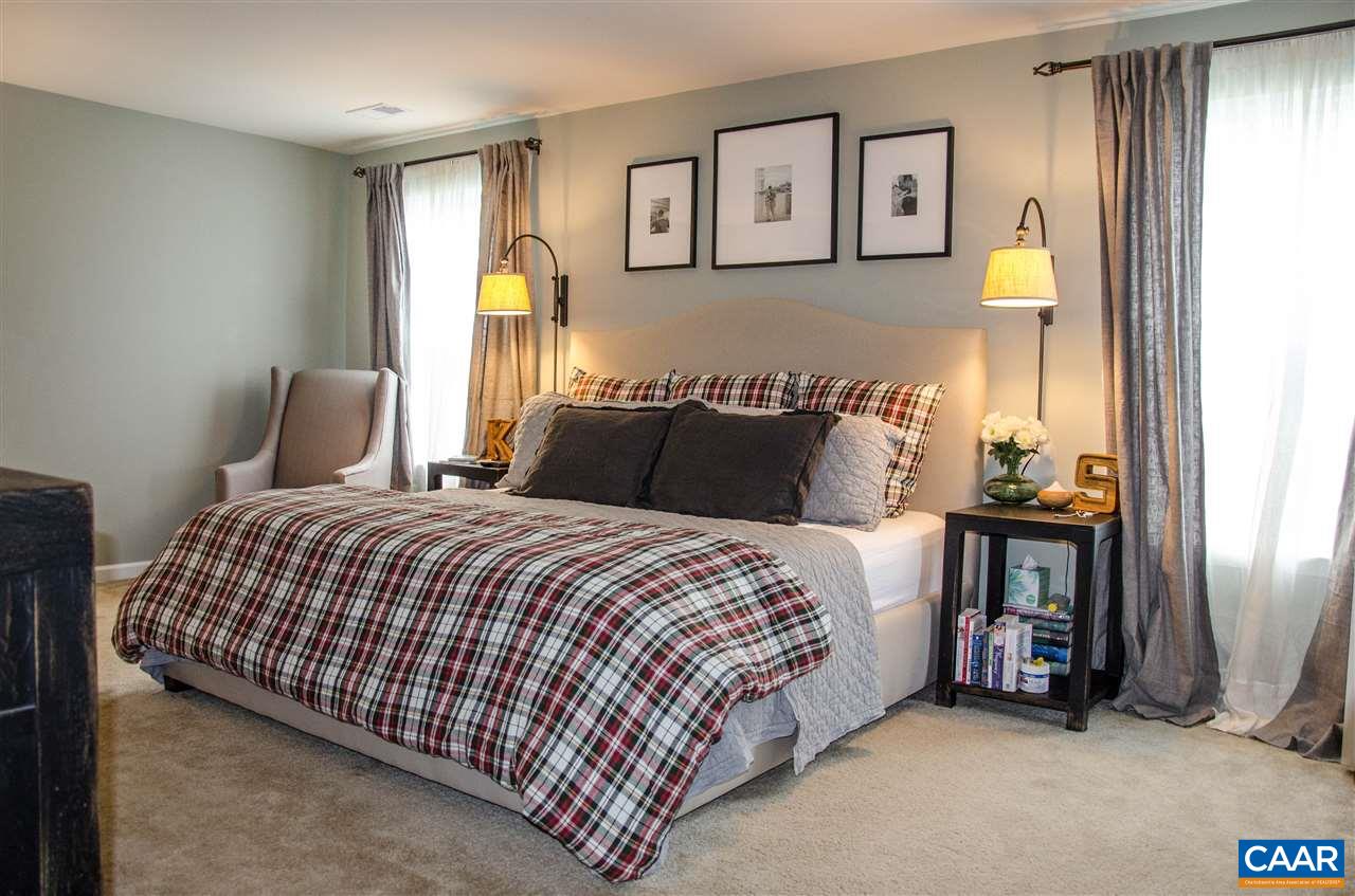 292 Ridgemont Road Ruckersville, VA 22968 - Photo 23 of 50 a bedroom with a bed and a window