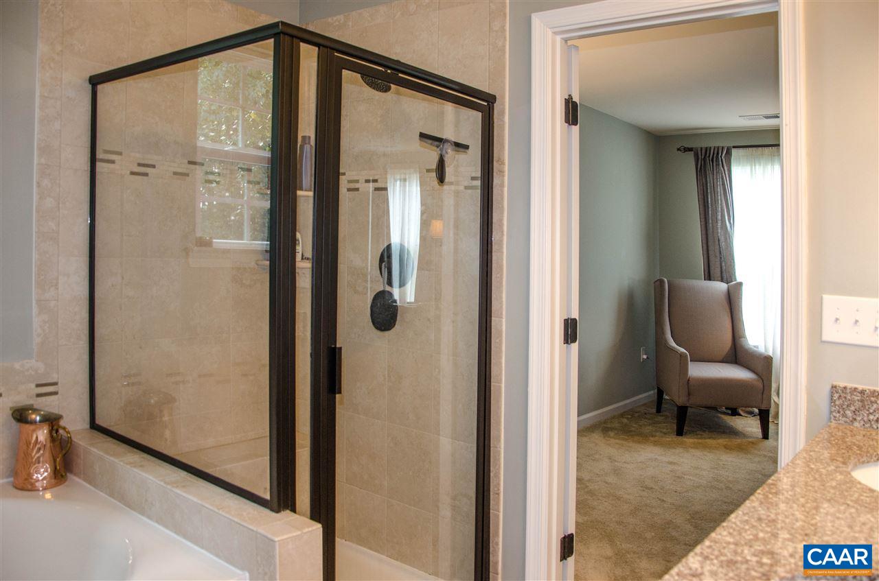 292 Ridgemont Road Ruckersville, VA 22968 - Photo 24 of 50 a view of a hallway with a elevator and a mirror