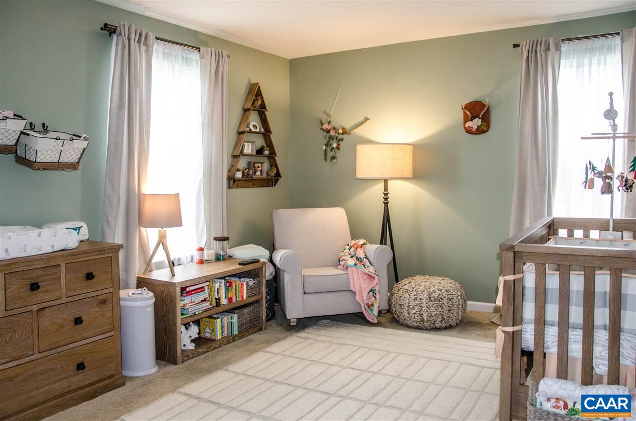 292 Ridgemont Road Ruckersville, VA 22968 - Photo 28 of 50 a bedroom with furniture and a window