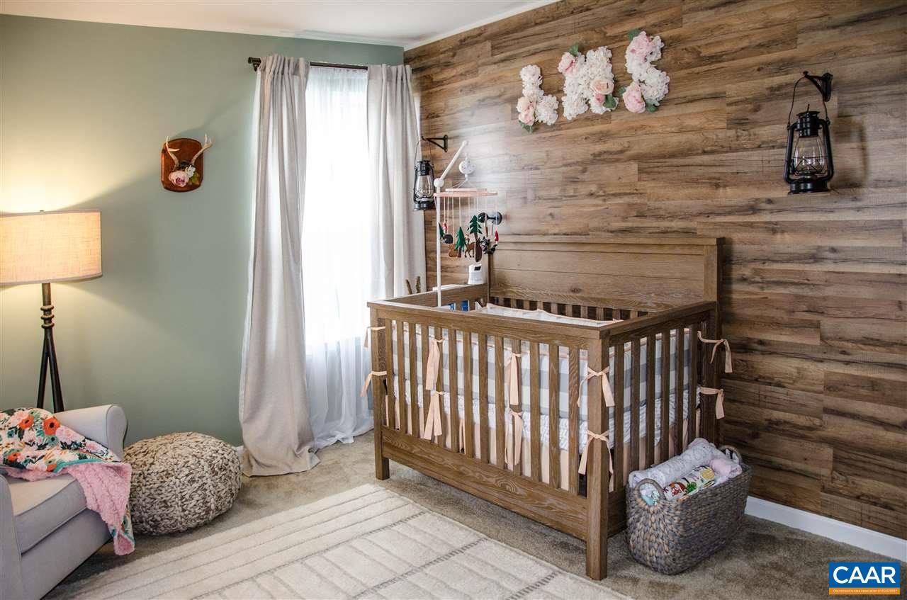 292 Ridgemont Road Ruckersville, VA 22968 - Photo 29 of 50 a bedroom with a bed and a window