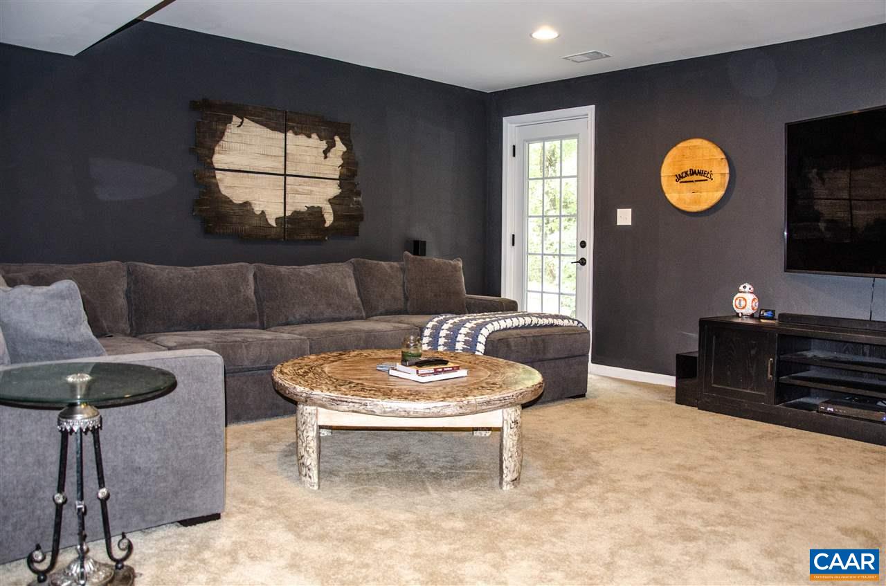 292 Ridgemont Road Ruckersville, VA 22968 - Photo 33 of 50 a living room with furniture and a window