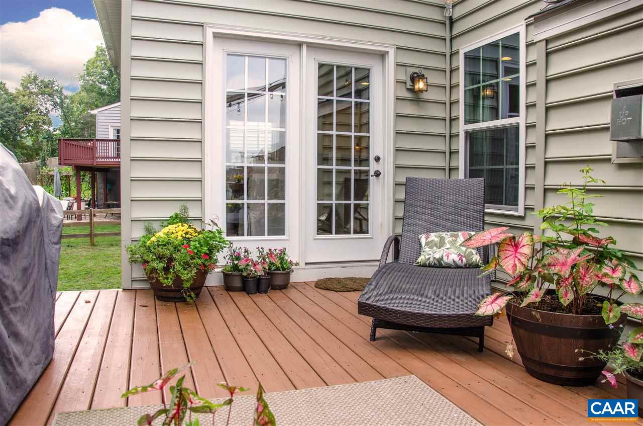 292 Ridgemont Road Ruckersville, VA 22968 - Photo 39 of 50 a view of a patio with couches and potted plants
