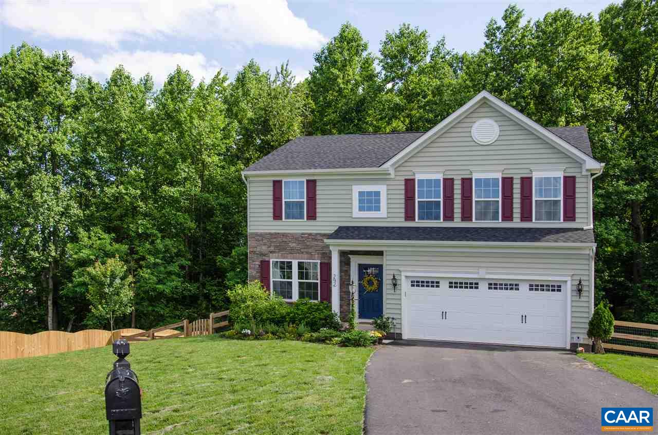 292 Ridgemont Road Ruckersville, VA 22968 - Photo 49 of 50 a front view of a house with a yard and garage