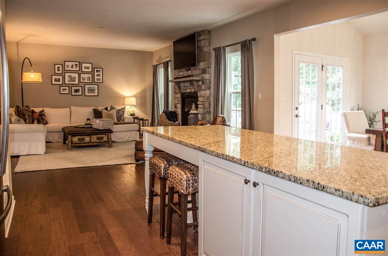 292 Ridgemont Road Ruckersville, VA 22968 - Photo 6 of 50 a living room with stainless steel appliances granite countertop furniture a couch and a large window