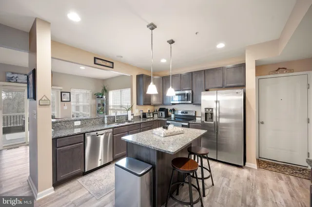 a room with furniture and wooden floor