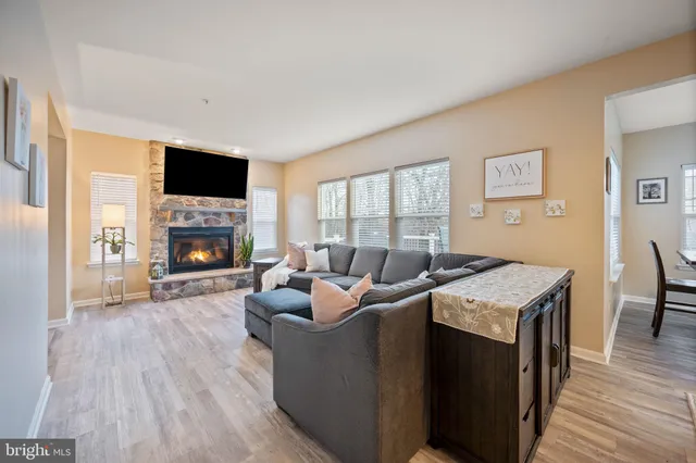 a room with furniture and wooden floor