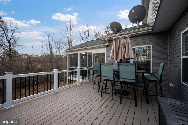 a bathroom with a shower and a sink