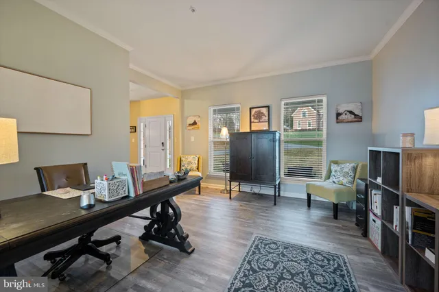 a bedroom with a bed and a book shelf