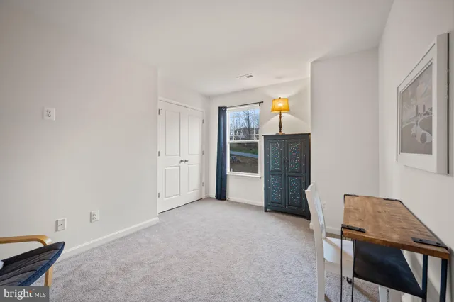a bathroom with a sink vanity and a mirror