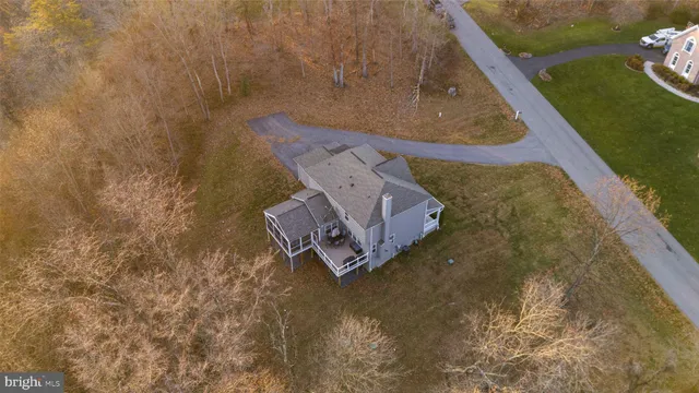 a view of a porch with a door and a couch
