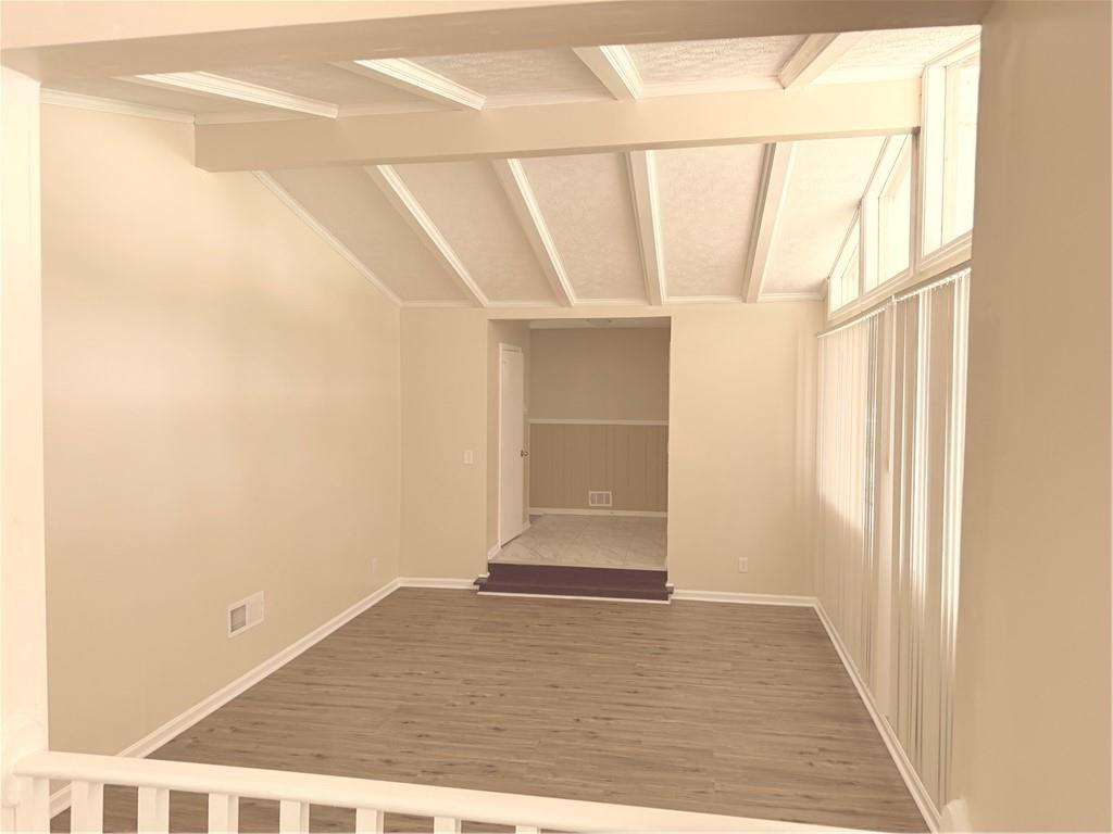 4707 Riverwood Circle Decatur, GA 30035 - Photo 4 of 17 a view of empty room with wooden floor