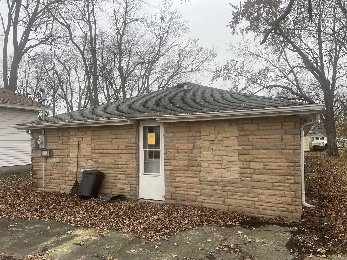 720 East Marion Street Clinton, IL 61727 - Photo 24 of 29 a view of a brick house with large windows