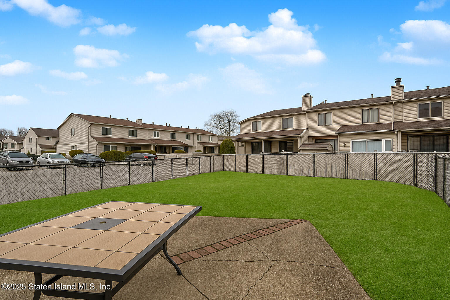 22 Regis Drive Staten Island, NY 10314 - Photo 20 of 22 a view of a house with a backyard