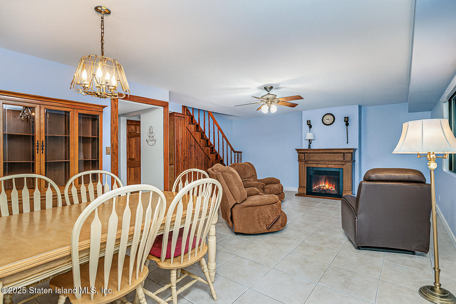 22 Regis Drive Staten Island, NY 10314 - Photo 9 of 22 a view of a livingroom with furniture and chandelier