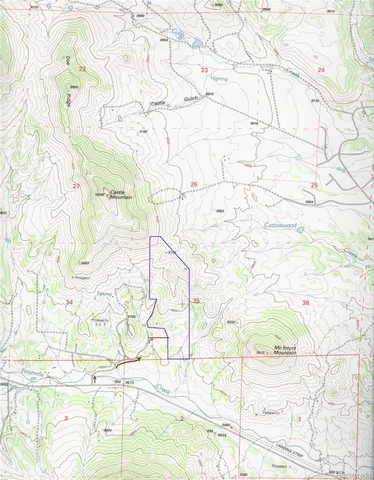 a white bench sitting in a yard