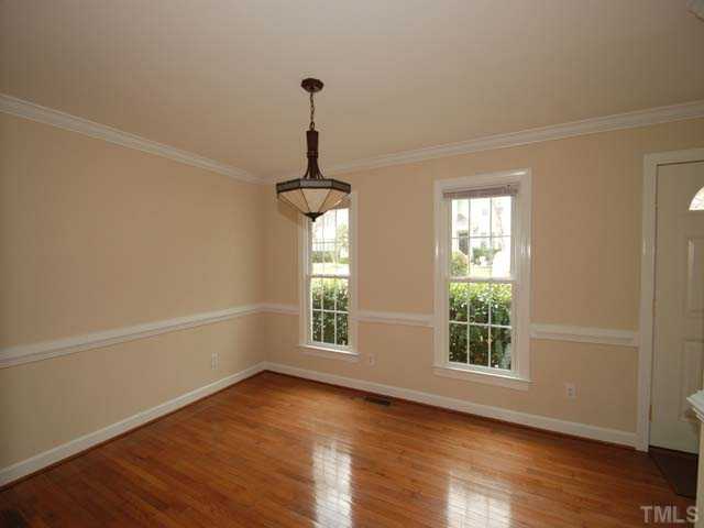 2224 Laurel Valley Way Raleigh, NC 27604 - Photo 3 of 12 Hardwood floors, crown molding and new light fiixtures.
