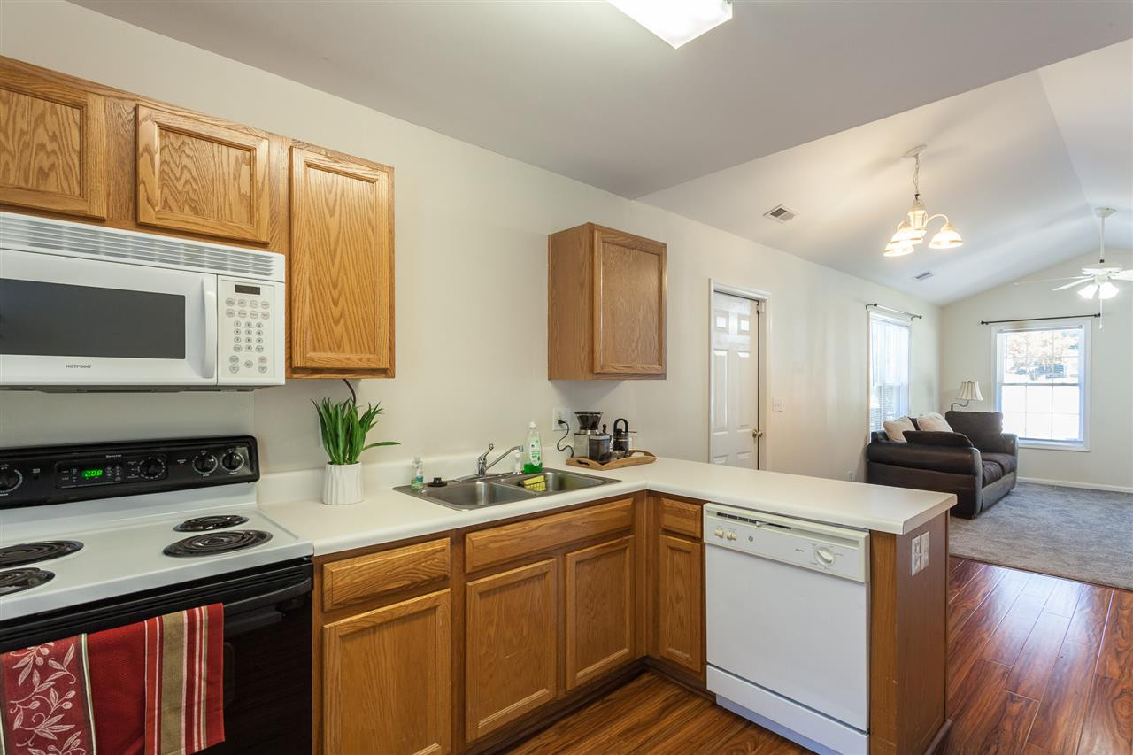 Space to eat at the counter with adjacent dining space Kitchen