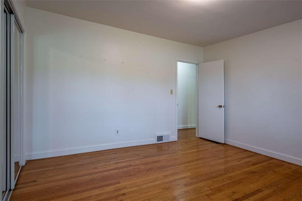 112 College Circle Cedartown, GA 30125 - Photo 20 of 35 a view of an empty room with wooden floor