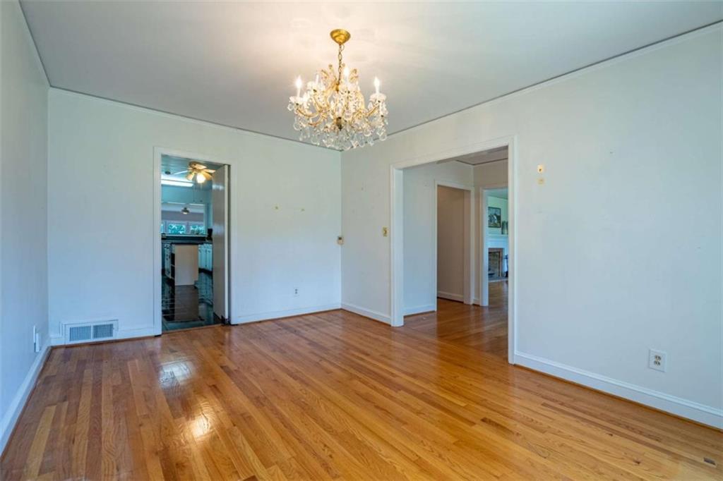 112 College Circle Cedartown, GA 30125 - Photo 27 of 35 a view of an empty room with wooden floor