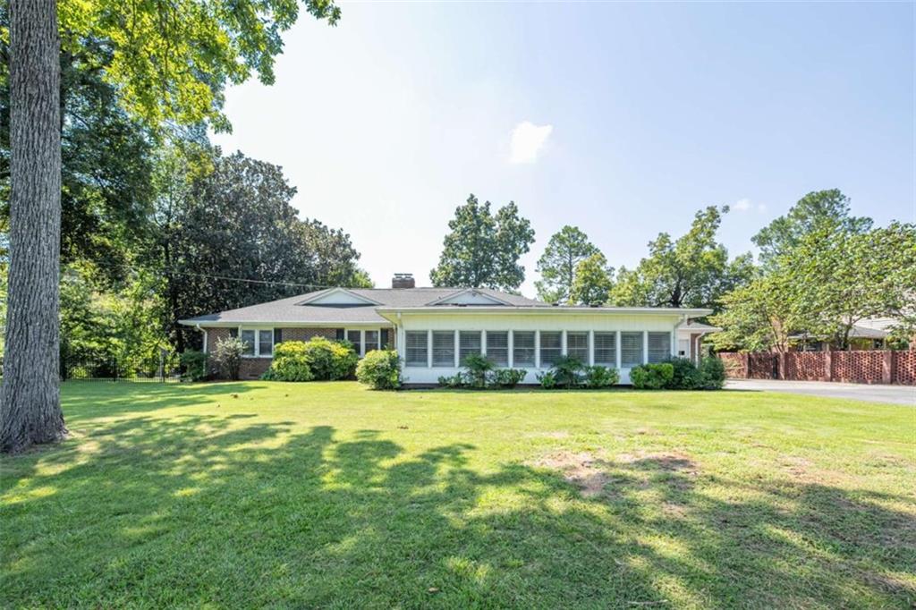 112 College Circle Cedartown, GA 30125 - Photo 28 of 35 a view of a house with a yard and sitting area