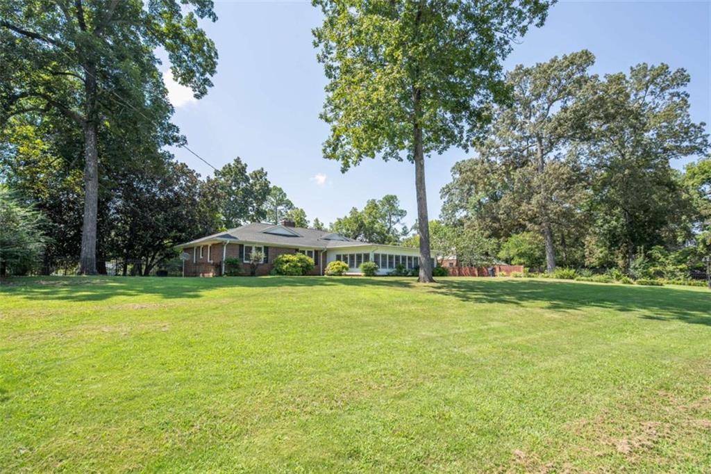 112 College Circle Cedartown, GA 30125 - Photo 29 of 35 a front view of a house with a yard