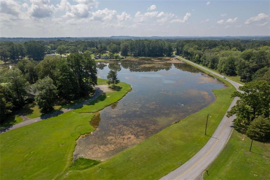 112 College Circle Cedartown, GA 30125 - Photo 33 of 35 a view of a lake with a yard