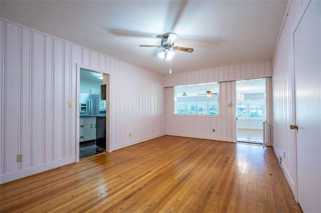 112 College Circle Cedartown, GA 30125 - Photo 8 of 35 wooden floor in an empty room with a window