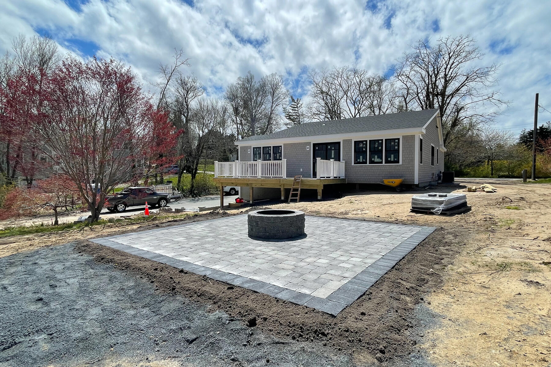 86 West Road Orleans, MA 02653 - Photo 8 of 16 a view of a house with a yard covered in snow