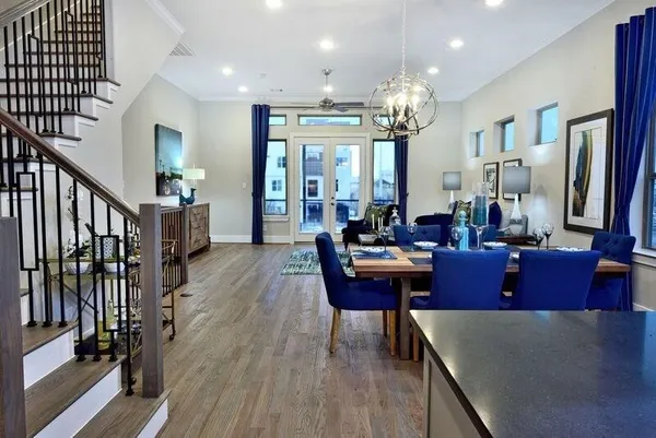 a lobby with furniture and wooden floor