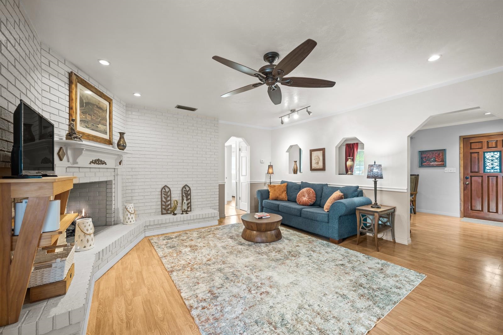 345 Cypress Road St. Augustine, FL 32086 - Photo 11 of 56 a living room with furniture and a flat screen tv