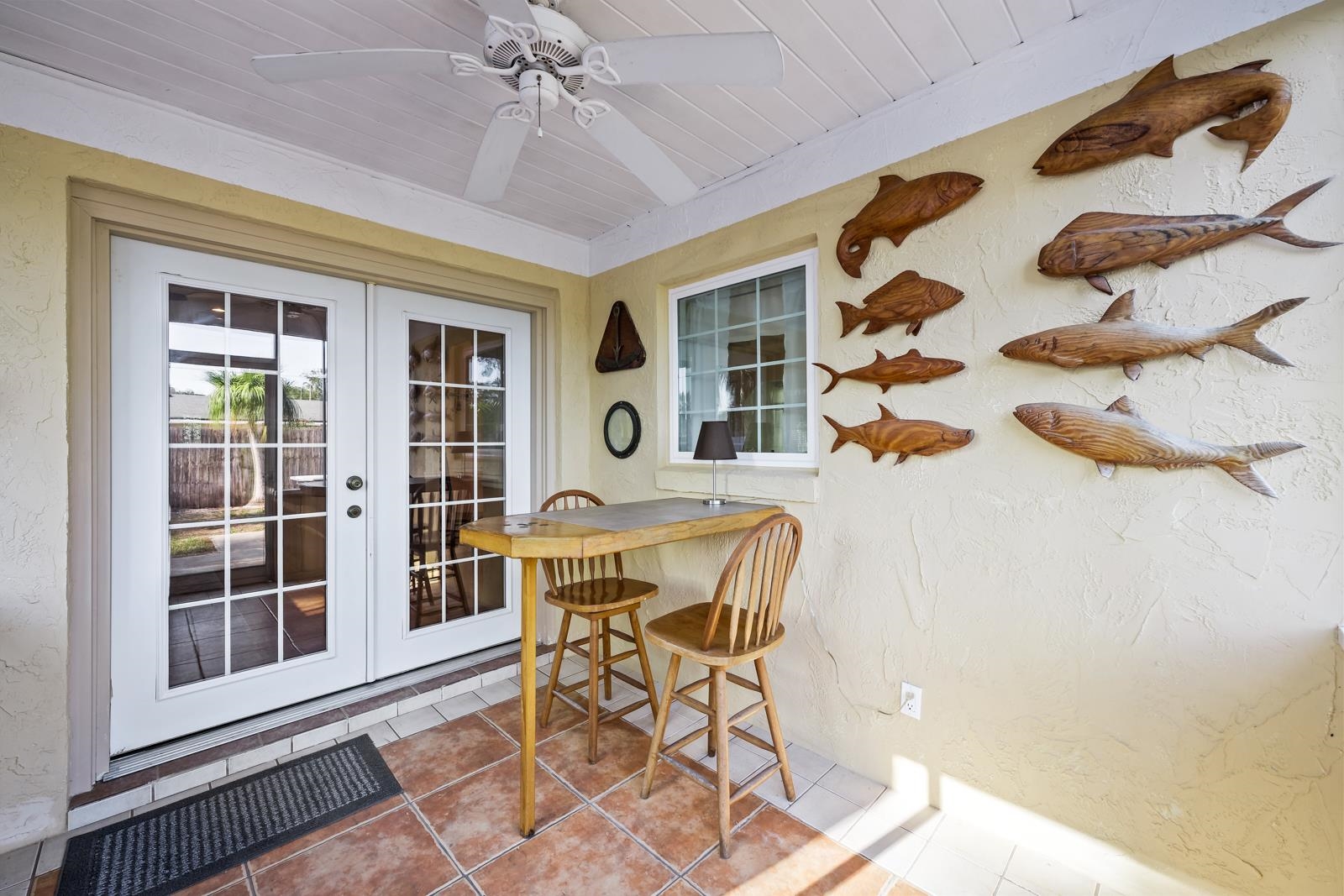 345 Cypress Road St. Augustine, FL 32086 - Photo 28 of 56 a view of a dining room with furniture and chandelier
